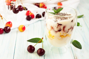 Dessert with cherry, yogurt, corn flakes