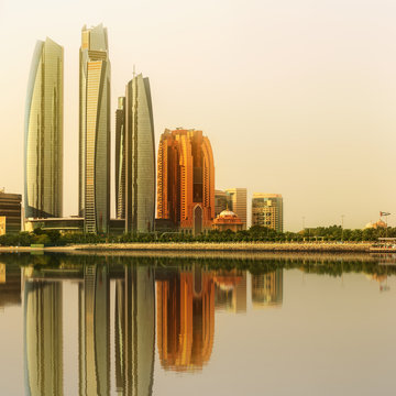 View of Abu Dhabi Skyline and Al Bateen marina at sunset, UAE