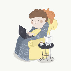 Boy is typing on laptop at home. 