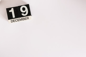 December 19th. Day 19 of month, calendar on white background. Winter time. Empty space for text
