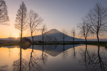 Mount Fuji during sunrise with small lake at Fumoto