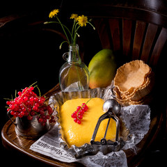 Homemade mango ice cream with currant