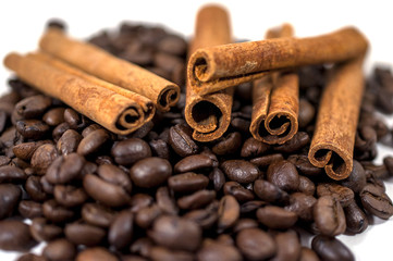 Coffee beans and Cinnamon on the white background - isolated