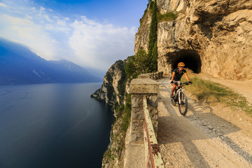 Mountain biking on Lake Garda, Sentiero della Ponale, Riva del Garda, Italy
