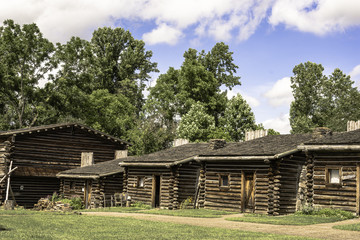 Fototapeta na wymiar reconstructed log cabins