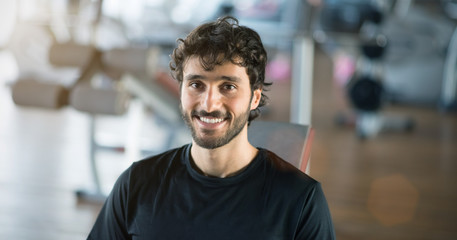 Fototapeta premium Portrait of a man in a gym