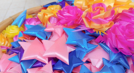 Colourful Ribbon forming stars and flowers