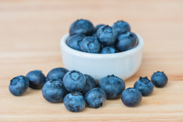 Blueberry on wooden table background