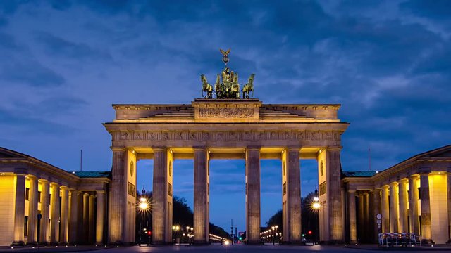 brandenburg gate sunrise timelapse transition  from night to day zoom out