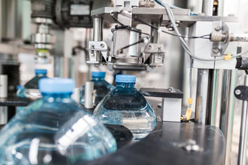 Water factory - Water bottling line for processing and bottling pure spring water into canisters.