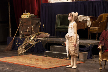 young girl performing in theater play 