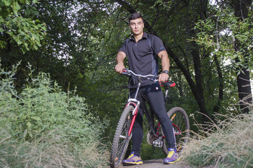 Obraz premium the guy rides a bike