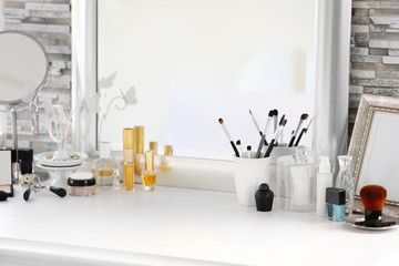 Cosmetic set on light dressing table