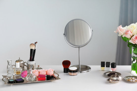 Cosmetic set on light dressing table