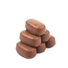 Chocolate coated toffee candy isolated
