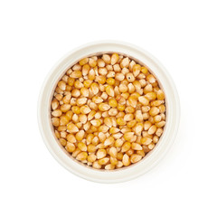 White ramekin filled with corn kernels