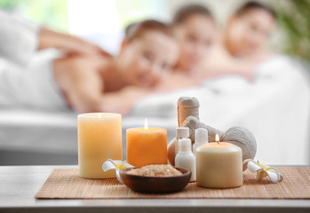 Spa composition and girls on blurred background