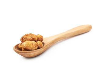 Spoon full of peanuts isolated
