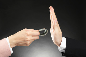 Businessman refusing to take bribe. Corruption concept