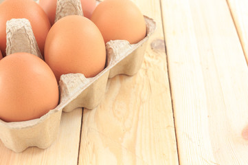 Egg in carton pack on wooden table, Chicken Egg