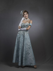 Fototapeta na wymiar Beautiful bride in elegant dress with embroidery
