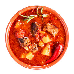 Bowl of hungarian goulash above isolated