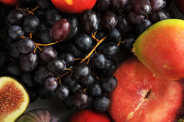fruit platter - grapes,  peaches, pears, cherries.