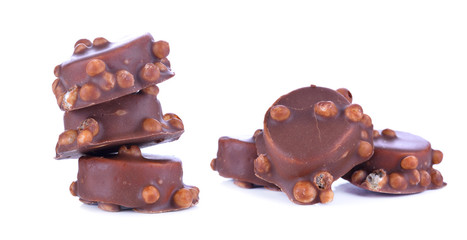 sweet filled chocolate cream cakes on a white background