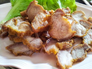 Closeup of fresh fried pork , thai food