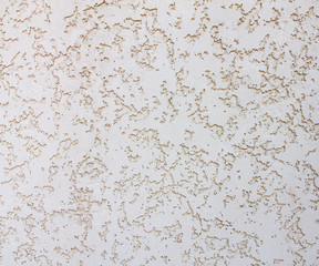 grey wall with decorative plaster as a background