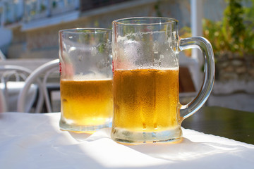 Two glasses of beer on the table
