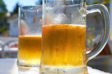 Two glasses of beer on the table