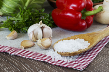 head of garlic and sea salt