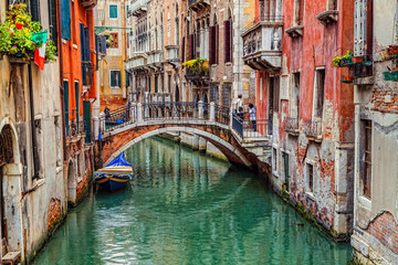 Fototapeta na wymiar Venice, Italy – JUNE 06, 2013: Tourists visiting the sights of Venice