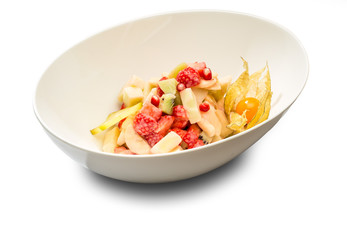 Dessert. Fruit salad in a deep plate