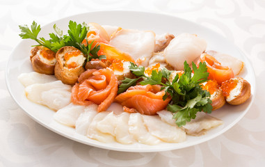 Fish plate on a white circular plate