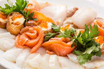 Fish plate decorated with greenery
