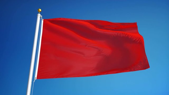 Red flag waving in slow motion against blue sky, seamlessly looped, close up, isolated on alpha channel with black and white luminance matte, perfect for film, news, digital composition