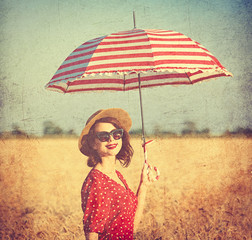 Fototapeta premium young woman with umbrella