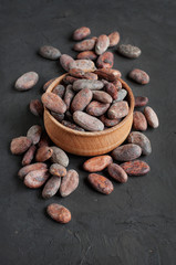 Cacao beans on a black slate