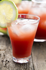 watermelon juice on wooden background