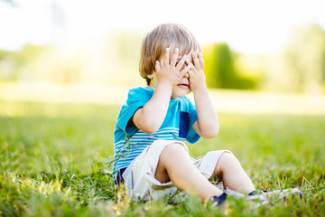 Fototapeta premium portrait of a little boy.portrait of a child in the park