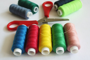 Bobbins of color thread