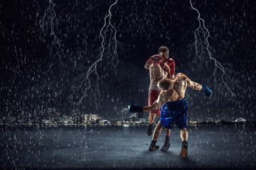 Box fighters trainning outdoor . Mixed media