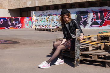 Young girl with the skateboard