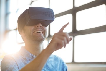 Male business executive using virtual glasses