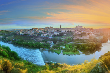 Panoramic view of ancient city and Alcazar on a hill over the Tagus River, Castilla la Mancha, Toledo, Spain