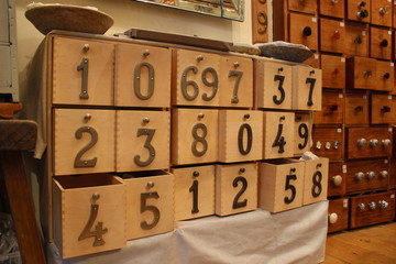 Drawers with numbers.