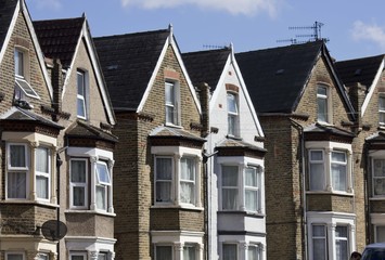 LONDON, UNITED KINGDOM - SEPTEMBER 12 2015: Traditional English terraced house in a row, in Woolwich Arsenal London district