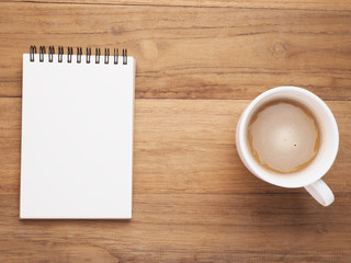 Obraz na płótnie Canvas open notebook and coffee
